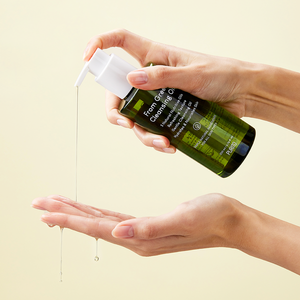 Purito From Green Cleansing Oil bottle with green label, displayed on a white background, showing the product's packaging.