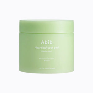 Abib Heartleaf Spot Pad Calming Touch by SELENAIRE, close-up of 80 soothing skincare pads with heartleaf extract.