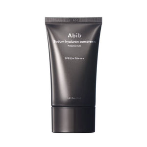 Abib Sedum Hyaluron Sunscreen SPF50+ tube with protective cap, featuring a sleek design and product details on the label.