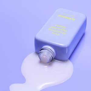 Selenaire By Wishtrend Pore Smoothing Bakuchiol Serum in a clear dropper bottle with serum drops on the surface.
