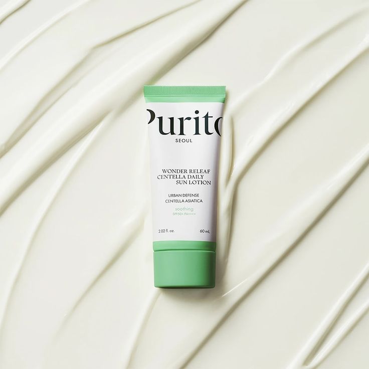 Purito Wonder Releaf Centella Daily Sun Lotion SPF50+ in a white tube, designed for skincare and sun protection.