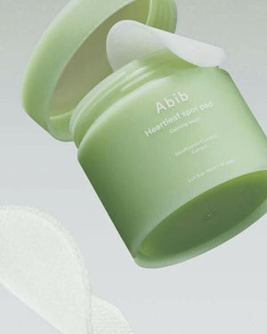 Abib Heartleaf Spot Pad from SELENAIRE, calming skincare pads in a package of 80, featuring natural ingredients for soothing skin.