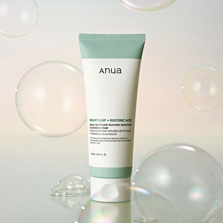 Selenaire Anua Heartleaf Succinic Moisture Cleansing Foam with a soft foam texture and heartleaf extract visible in the image.