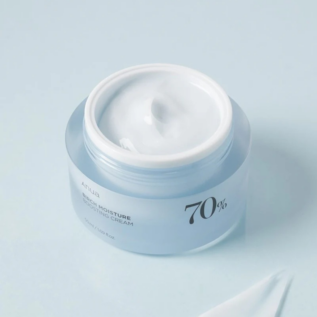 Selenaire Anua Birch 70 Moisture Boosting Cream jar with white lid and clear label, showcasing the hydrating skincare product.