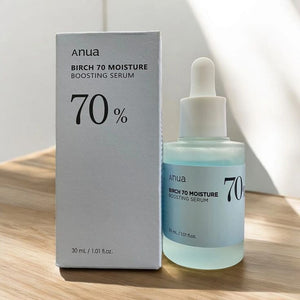 Selenaire Anua Birch 70 Moisture Boosting Serum in a clear glass bottle with dropper, showcasing its hydrating skincare formula.