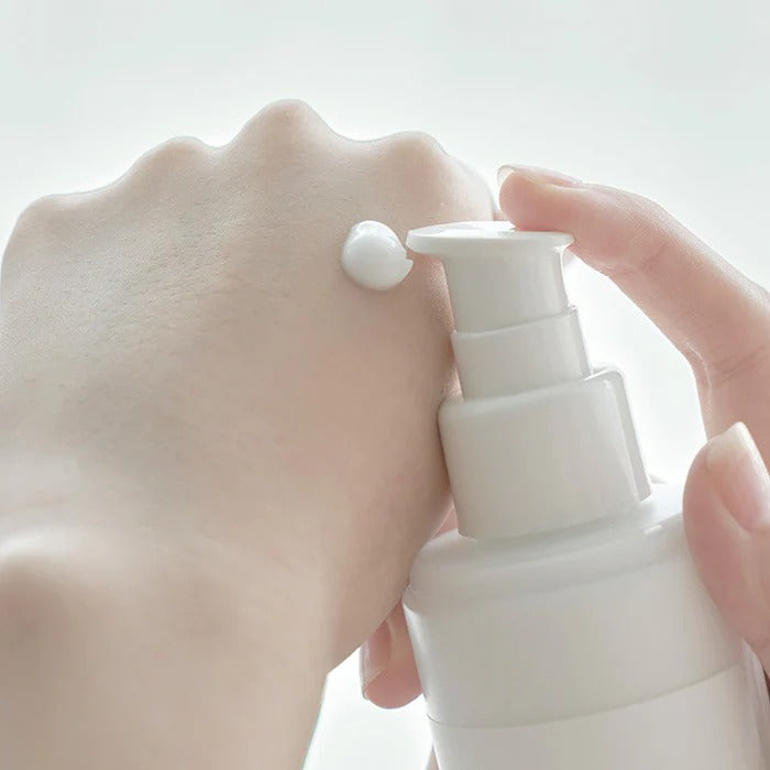 Selenaire Anua Heartleaf 70% Daily Lotion in a pump bottle, showing the bottle with label and product details.