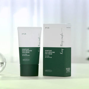 Selenaire Anua Heartleaf Silky Moisture Sunscreen tube with heartleaf design and SPF protection, displaying smooth, creamy texture
