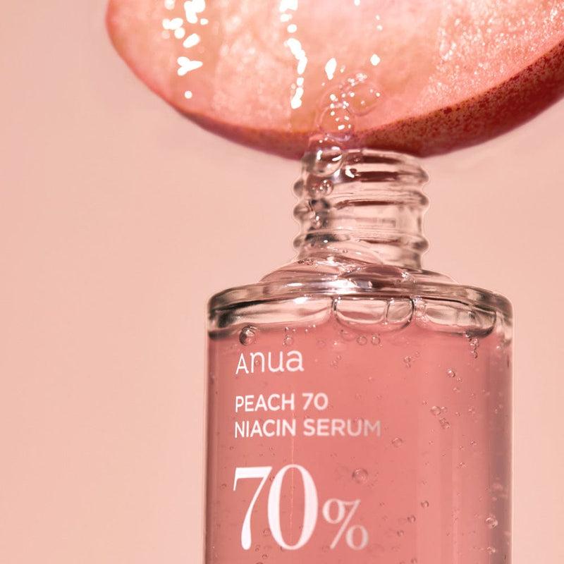 Selenaire Anua Peach 70% Niacinamide Serum in a clear dropper bottle, showcasing the product with a peach and skincare theme.