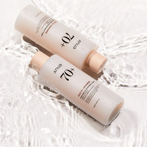 Selenaire Anua Rice 70 Glow Milky Toner bottle with white cap and label, shown on a clean surface.