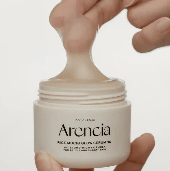 SELENAIRE Arencia Rice Mucin Glow Serum 30ml bottle with dropper, showcasing the skincare product on a neutral background.