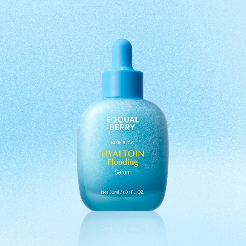 Blue skincare serum bottle with dropper on a light blue background