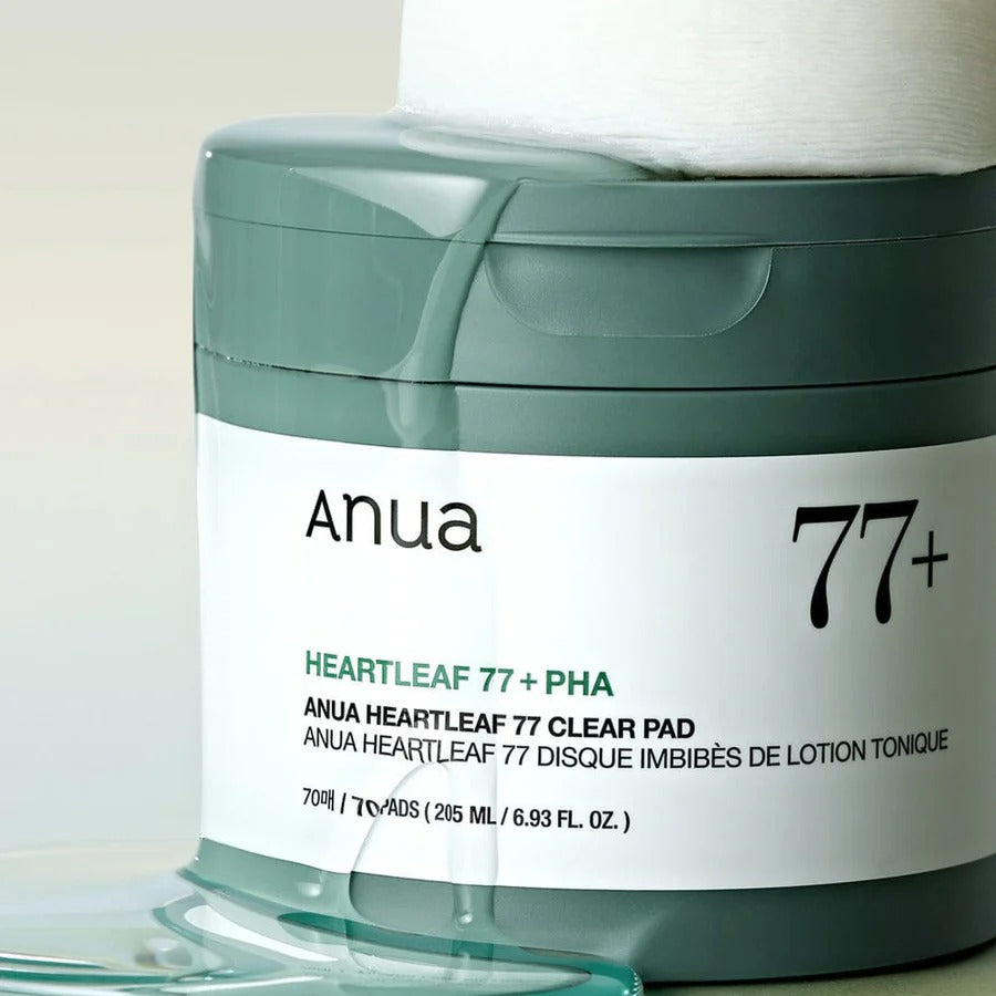 Selenaire Anua Heartleaf 77% Clear Pad showing a close-up of the exfoliating pad with heartleaf extract in a clear container