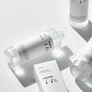 Selenaire Anua Heartleaf 77% Soothing Toner in a clear bottle with a light green liquid, designed for calming skin.