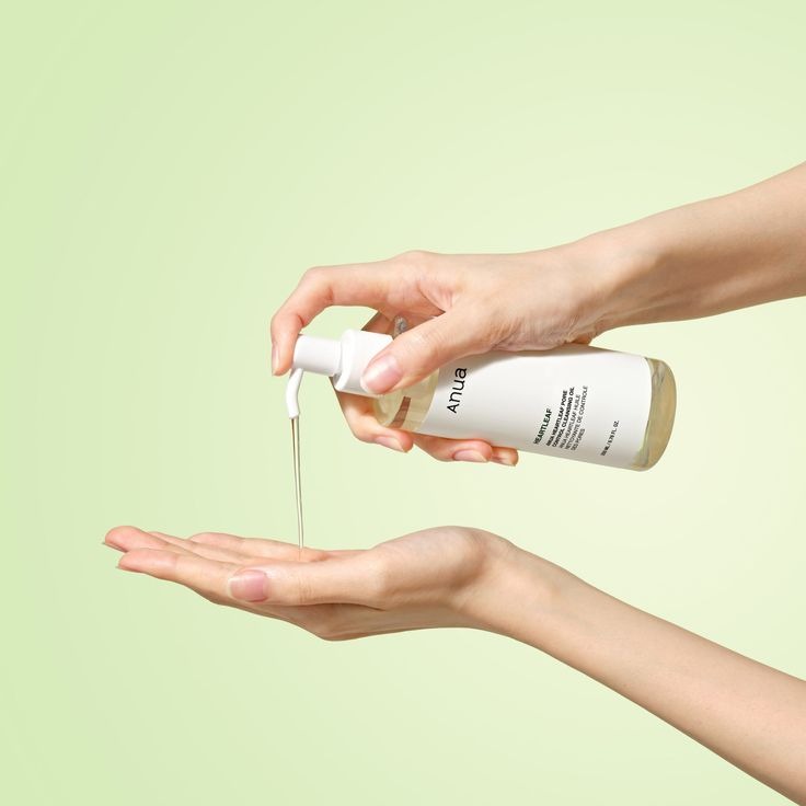 Selenaire Anua Heartleaf Pore Control Cleansing Oil bottle with pump, designed for oily and acne-prone skin, close-up shot.
