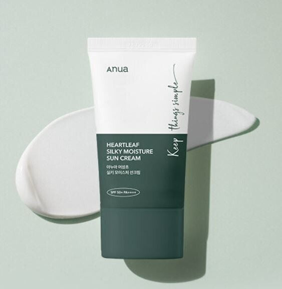 Selenaire Anua Heartleaf Silky Moisture Sunscreen in a white tube with green accents, showing the product label and cap.