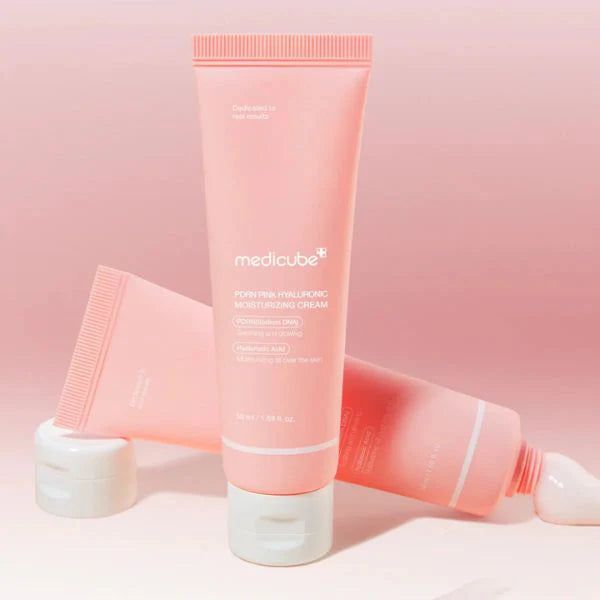 Medicube PDRN Pink Hyaluronic Moisturizing Cream jar with pink label and product details, showcasing the skincare cream.