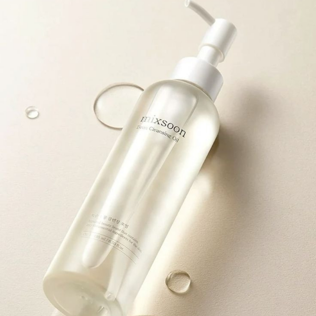 Bottle of Mixsoon Bean Cleansing Oil by SELENAIRE, showing the product label and clear liquid inside a pump bottle.