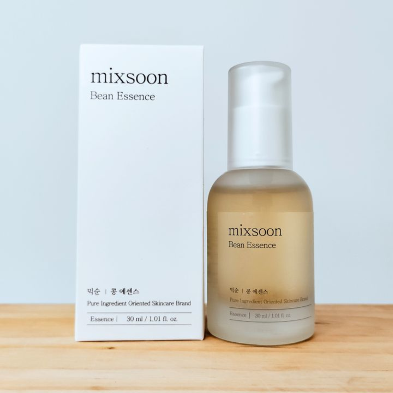 Mini bottle of MIXSOON Bean Essence by Selenaire showing the product label and clear liquid inside.