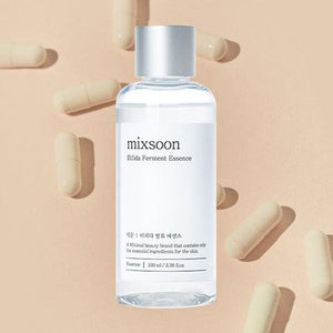Bottle of Selenaire Mixsoon Bifida Ferment Essence with label visible, featuring clear liquid and minimalist design.