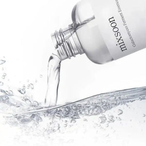 Bottle of MIXSOON Galactomyces Ferment Essence by Selenaire with a clear label and a dropper cap, set against a neutral background.