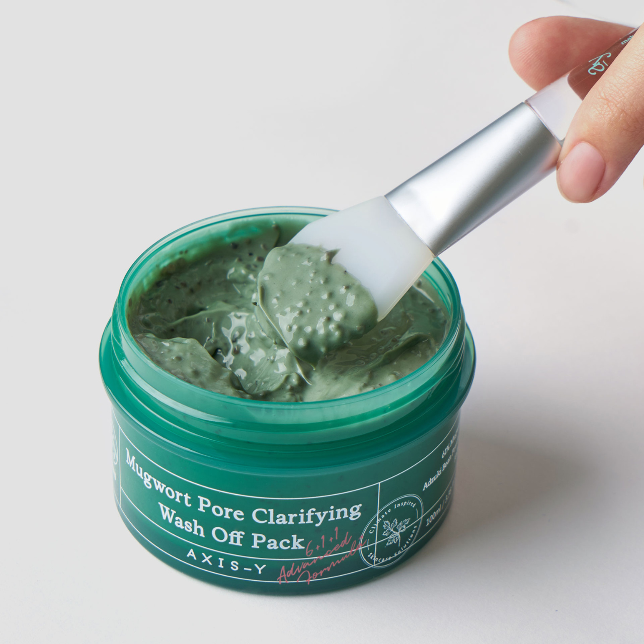 Selenaire AXIS-Y Mugwort Pore Clarifying Wash Off Pack with mugwort and natural ingredients for deep pore cleansing, shown in a jar.