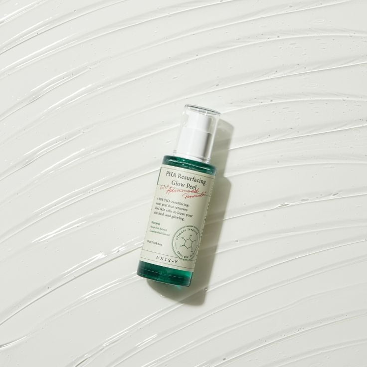 AXIS-Y PHA Resurfacing Glow Peel by SELENAIRE showing a clear bottle with a pump dispenser and a glowing skincare product inside