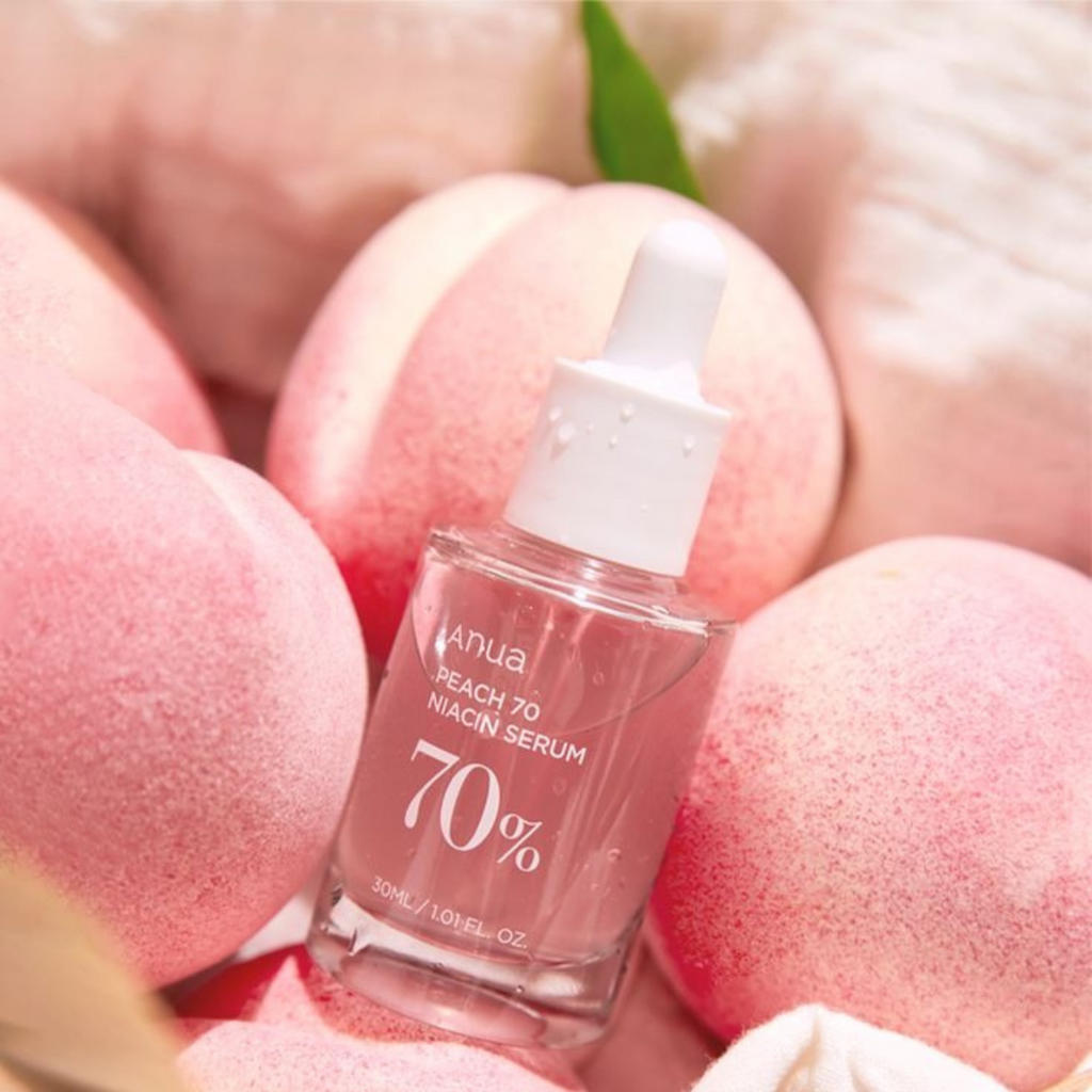 Selenaire Anua Peach 70% Niacinamide Serum bottle with a peach-colored label and dropper applicator.