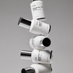 Bottle of Anua Retinol 0.3% + Niacin Renewing Serum by SELENAIRE with a sleek label and dropper applicator.