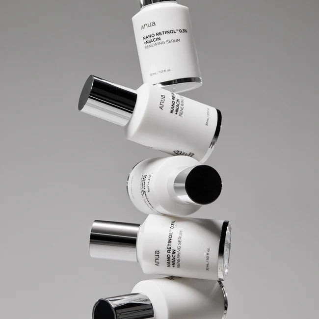 Bottle of Anua Retinol 0.3% + Niacin Renewing Serum by SELENAIRE with a sleek label and dropper applicator.