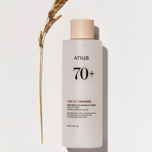 Selenaire Anua Rice 70 Glow Milky Toner bottle with white and gold packaging, showing the product label and design.