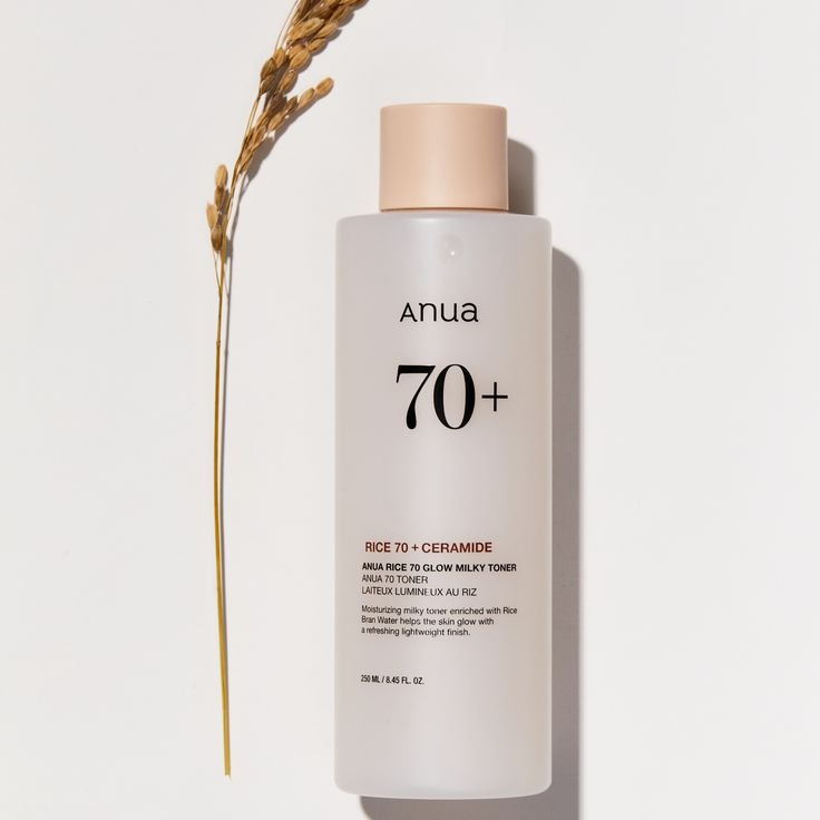 Selenaire Anua Rice 70 Glow Milky Toner bottle with white and gold packaging, showing the product label and design.