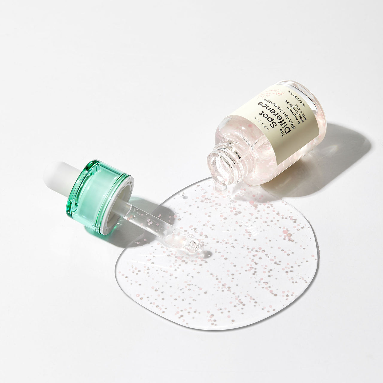 Selenaire AXIS-Y Spot The Difference Blemish Treatment tube with applicator, designed for targeted skin blemish care.