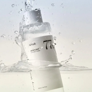 Selenaire Anua Heartleaf 77% Soothing Toner in a clear bottle, with a minimalist label and light green liquid for calming skincare.