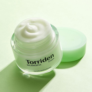 Torriden Balanceful Cica Cream jar with green and white packaging, featuring a smooth, creamy texture and natural skincare branding.