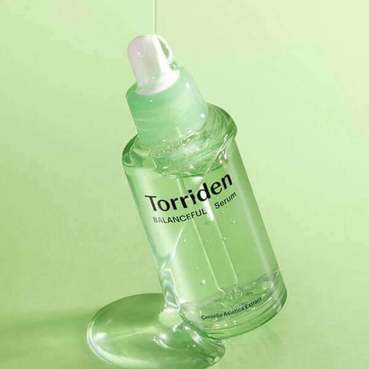 Selenaire Torriden Balanceful Cica Serum in a clear glass bottle with dropper, designed for soothing and calming skin.