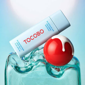 Selenaire Tocobo Bio Watery Sun Cream SPF 50 showing the lightweight, hydrating cream texture in a clear jar with a white lid.