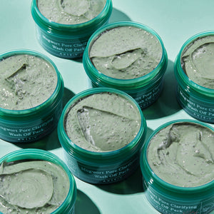 Selenaire AXIS-Y Mugwort Pore Clarifying Wash Off Pack in a jar, with natural ingredients and herbal extract visible.